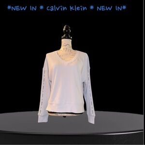 NWOT- Calvin Klein Performance V-Neck light blue sweatshirt.